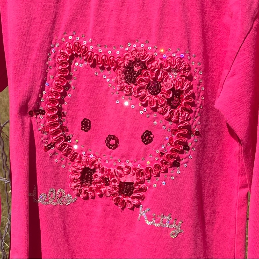 Adorable Hello Kitty Fuchsia Long Sleeve Tee for Kids. Size 7-8